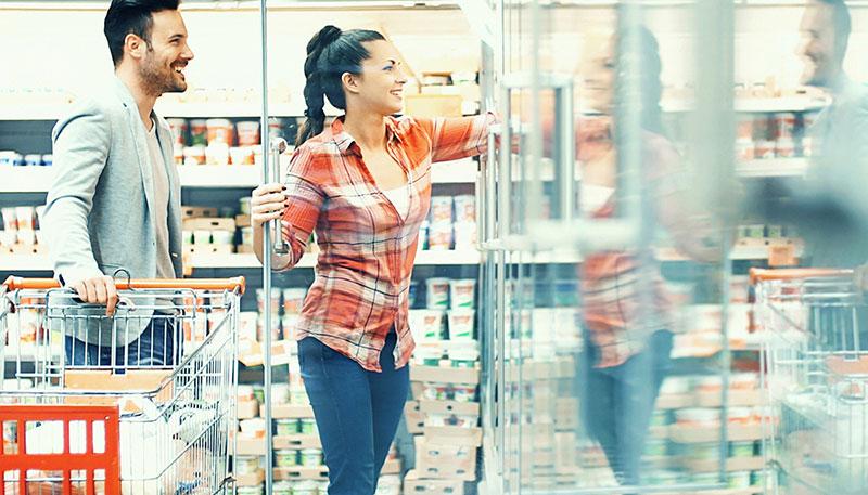 couple shopping in freezer